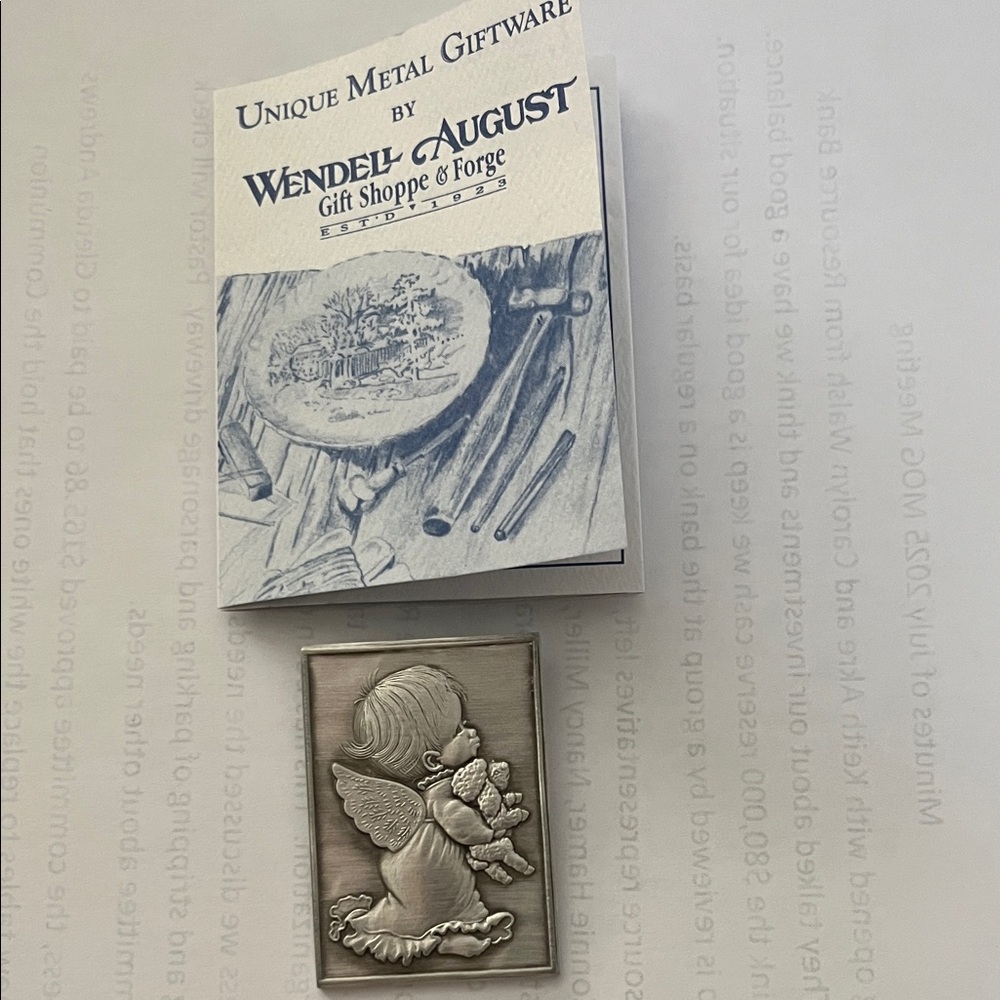 Wendell August aluminum pin that is 1 1/4” by 1 3/4”.  Never worn